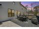Spacious back deck with a dining table and BBQ grill offers a great outdoor space for dining and relaxation at 4980 Wildeoak Trl, Douglasville, GA 30135