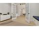 Bright foyer showcasing an open-concept design with luxury vinyl plank flooring, and staircase to upper level at 4980 Wildeoak Trl, Douglasville, GA 30135
