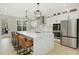 Bright, modern kitchen with a large island, stainless steel appliances and lots of natural light at 4980 Wildeoak Trl, Douglasville, GA 30135