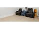 Home theater with comfortable recliner seating is perfect for immersive movie nights and entertainment at 4980 Wildeoak Trl, Douglasville, GA 30135