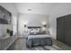 Bright bedroom features a comfortable bed, modern decor, and a large closet for ample storage at 652 Hugh Sw St, Atlanta, GA 30310