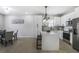 Modern kitchen with white cabinetry, stainless steel appliances, and an island at 652 Hugh Sw St, Atlanta, GA 30310