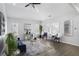 Bright and airy living room featuring hardwood floors and large windows at 652 Hugh Sw St, Atlanta, GA 30310