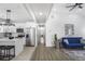 Open floor plan featuring a living room that connects to a modern kitchen at 652 Hugh Sw St, Atlanta, GA 30310