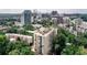 Stunning aerial view of the building with city views and beautiful green landscape of the surrounding neighborhood at 1 Biscayne Nw Dr # 410, Atlanta, GA 30309