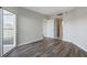 Bedroom featuring new floors and access to outdoor patio at 1 Biscayne Nw Dr # 410, Atlanta, GA 30309