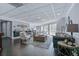 Spacious clubhouse with comfortable seating, bar area, and natural light at 1 Biscayne Nw Dr # 410, Atlanta, GA 30309
