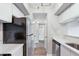 Galley kitchen with stainless steel appliances and white cabinetry at 1 Biscayne Nw Dr # 410, Atlanta, GA 30309