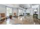 A modern lobby with stylish chairs, plants, and tile flooring welcomes residents and guests at 1 Biscayne Nw Dr # 410, Atlanta, GA 30309