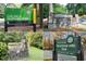 Selection of park signs for neighborhood parks including Louise G Howard Park and Peachtree Hills Park at 1 Biscayne Nw Dr # 410, Atlanta, GA 30309