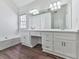 Bathroom with double vanity, quartz countertop, and natural light; a spa-like retreat at 423 Eagle Ridge Trl, Canton, GA 30114