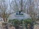Eagle Ridge community entrance sign surrounded by trees and greenery at 423 Eagle Ridge Trl, Canton, GA 30114