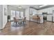 Charming dining area with adjacent modern kitchen with stainless steel appliances at 423 Eagle Ridge Trl, Canton, GA 30114