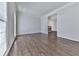 Spacious living room featuring hardwood floors and fireplace with a charming view at 423 Eagle Ridge Trl, Canton, GA 30114