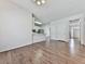 Living room with breakfast bar that opens to kitchen and view of hallway at 423 Eagle Ridge Trl, Canton, GA 30114