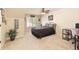 Cozy bedroom featuring a comfortable bed, natural light from the window, and a dedicated workspace at 4540 Brighton View Trl, Cumming, GA 30040