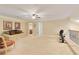 Spacious bonus room with plush carpeting, neutral tones, and a view into the bathroom and bedrooms at 4540 Brighton View Trl, Cumming, GA 30040