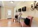 Bright foyer featuring hardwood floors, elegant decor, and a welcoming atmosphere for guests at 4540 Brighton View Trl, Cumming, GA 30040