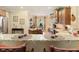 Kitchen eat-in bar featuring granite countertops, stainless steel appliances, and overhead cabinets at 4540 Brighton View Trl, Cumming, GA 30040