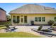 Spacious patio area featuring outdoor seating, grill, and a cozy fire pit at 4540 Brighton View Trl, Cumming, GA 30040