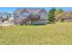 Expansive backyard with a wood deck and plenty of space for outdoor activities at 1515 Summer Lake Ter, Loganville, GA 30052