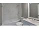 Bathroom features a tub and shower combination and a single vanity at 1515 Summer Lake Ter, Loganville, GA 30052