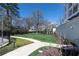 This verdant lawn offers a peaceful retreat, complemented by mature trees and a paved pathway for leisurely strolls at 2500 Peachtree Nw Rd # 207S, Atlanta, GA 30305