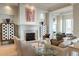 Comfortable living room with fireplace, modern decor, and cozy seating perfect for relaxation at 2500 Peachtree Nw Rd # 207S, Atlanta, GA 30305