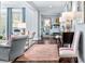 Cozy living room showcasing an inviting space with hardwood floors and access to the bedroom at 2500 Peachtree Nw Rd # 207S, Atlanta, GA 30305