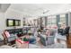 Spacious living room with hardwood floors, a ceiling fan, and plenty of natural light at 2500 Peachtree Nw Rd # 207S, Atlanta, GA 30305