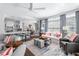 Elegant living room featuring an open floor plan, stylish furniture, and bright natural light at 2500 Peachtree Nw Rd # 207S, Atlanta, GA 30305