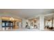 Elegant lobby with chandelier, hardwood floors, fireplace, and luxurious seating arrangements at 2500 Peachtree Nw Rd # 207S, Atlanta, GA 30305