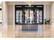 Sophisticated lobby area with decorative table, floral arrangements, and bright marble flooring at 2500 Peachtree Nw Rd # 207S, Atlanta, GA 30305