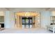 Open lobby space featuring marble floors, grand columns, and a central decorative table with flowers at 2500 Peachtree Nw Rd # 207S, Atlanta, GA 30305