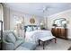Elegant main bedroom with blue accents, sophisticated furnishings, and serene decor at 2500 Peachtree Nw Rd # 207S, Atlanta, GA 30305