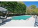 Inviting community pool surrounded by lounge chairs and tables with umbrellas at 2500 Peachtree Nw Rd # 207S, Atlanta, GA 30305