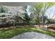 Tranquil turf area boasts lush greenery, mature trees, and inviting benches for relaxation and leisure at 2500 Peachtree Nw Rd # 207S, Atlanta, GA 30305