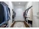 Spacious walk-in closet features built-in shelving and ample storage for clothes at 2500 Peachtree Nw Rd # 207S, Atlanta, GA 30305