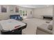 Bright basement featuring natural light, comfortable seating, and a game table at 152 Vinings Lake Ct, Mableton, GA 30126