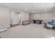 Large finished basement featuring an open layout with a sitting area and game table at 152 Vinings Lake Ct, Mableton, GA 30126