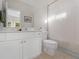 Bright bathroom featuring a white vanity, tile flooring, and a shower with white curtain at 152 Vinings Lake Ct, Mableton, GA 30126