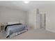 Spacious bedroom with carpeted floors, large window and doorways at 152 Vinings Lake Ct, Mableton, GA 30126
