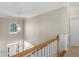 Foyer view from the second floor with front door and bright windows at 152 Vinings Lake Ct, Mableton, GA 30126
