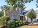Charming two-story brick home featuring a well-manicured lawn and a two-car garage at 152 Vinings Lake Ct, Mableton, GA 30126