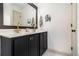 Bathroom with a double sink vanity, modern fixtures and tiled floor at 2531 Paul Nw Ave, Atlanta, GA 30318