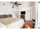Primary bedroom featuring white walls, dark hardwood floors, and large windows for natural light at 2531 Paul Nw Ave, Atlanta, GA 30318