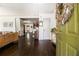 Inviting entryway with hardwood floors, a decorative wreath, and an open view to the living area at 2531 Paul Nw Ave, Atlanta, GA 30318