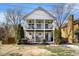 Charming two-story home with double porches and well-manicured landscaping at 2531 Paul Nw Ave, Atlanta, GA 30318