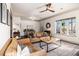 Comfortable living room featuring stylish furniture, a ceiling fan, and natural light at 2531 Paul Nw Ave, Atlanta, GA 30318