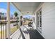 Front porch with seating and hanging plants overlooking the neighborhood at 2531 Paul Nw Ave, Atlanta, GA 30318